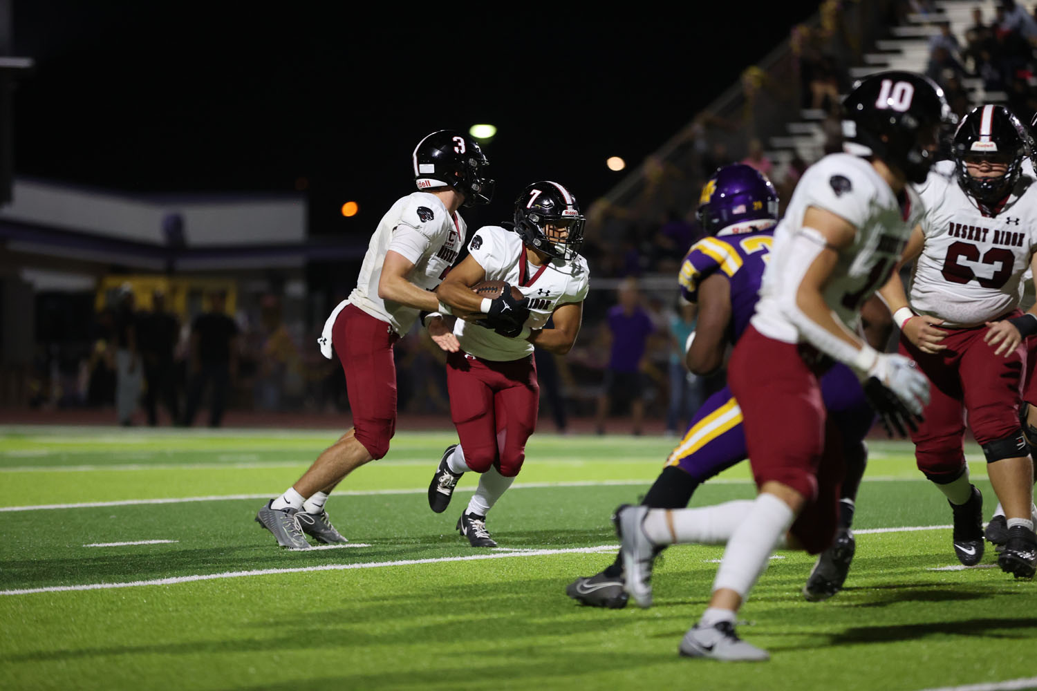 QB making the handoff to the RB