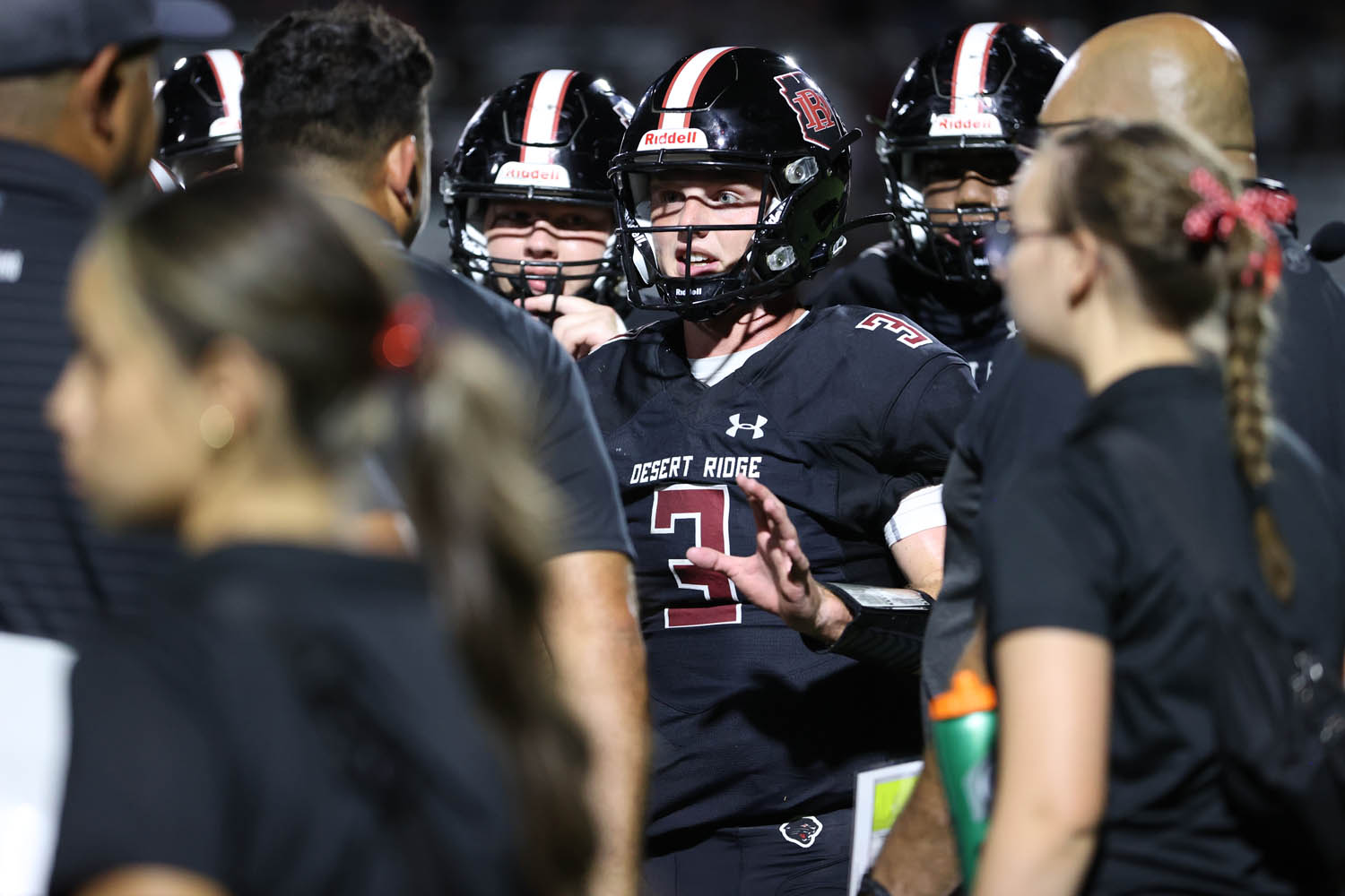 QB talking to coach