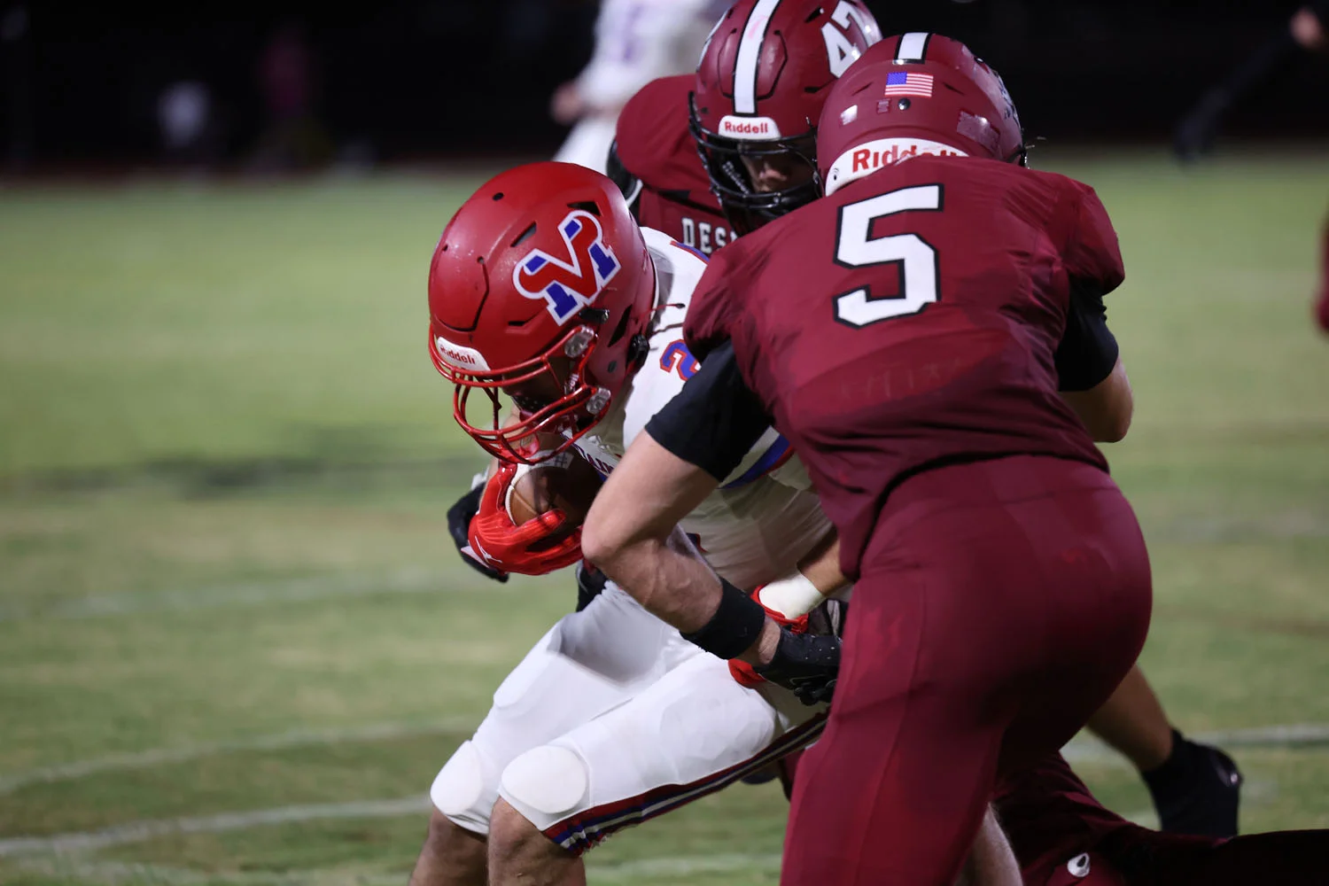 DRHS teammates tackling the ball carrier